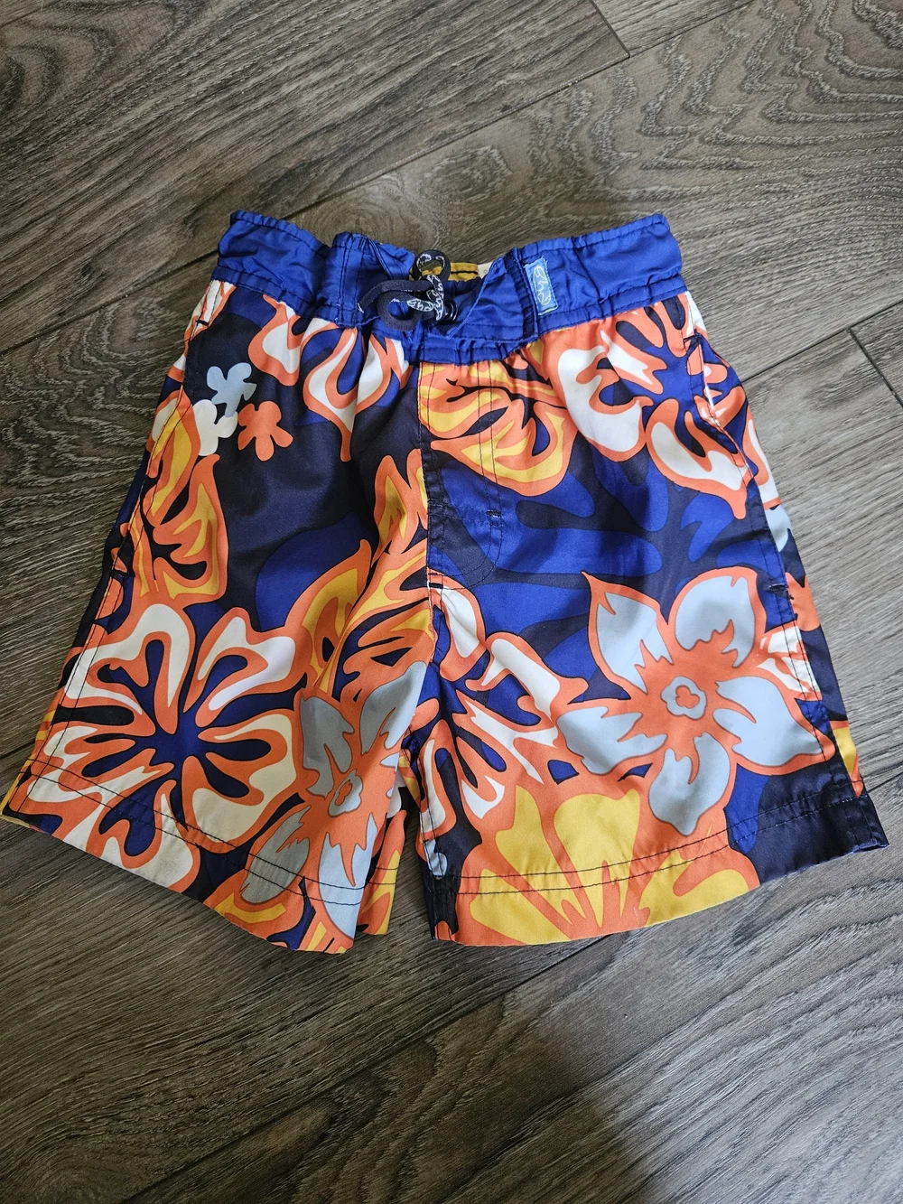 Pair Of Spider-Man Red Swim Trunks and Blue-Orange Floral Swim Shorts - Kids
